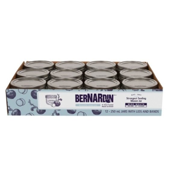 Bernardin wide-mouth 250 mL mason jars, 12-pack with lids and bands, displayed in original packaging.